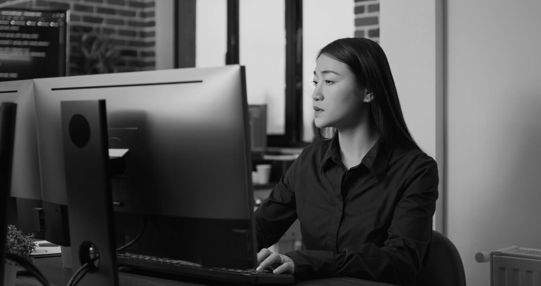 Student working on detailed character model with visible topology wireframe