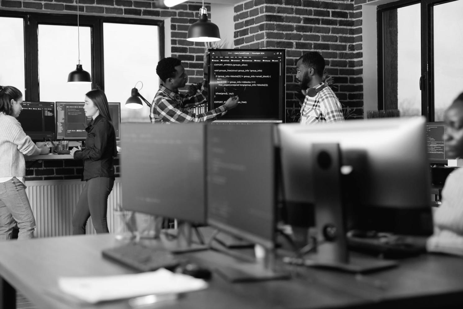 Team collaboration workspace at Voltraxis Edge studio in Gijón